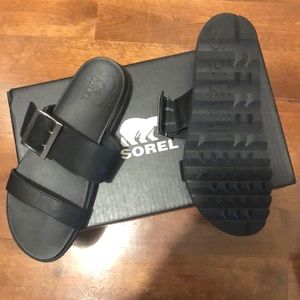 Ladies sorel slides.  New in box